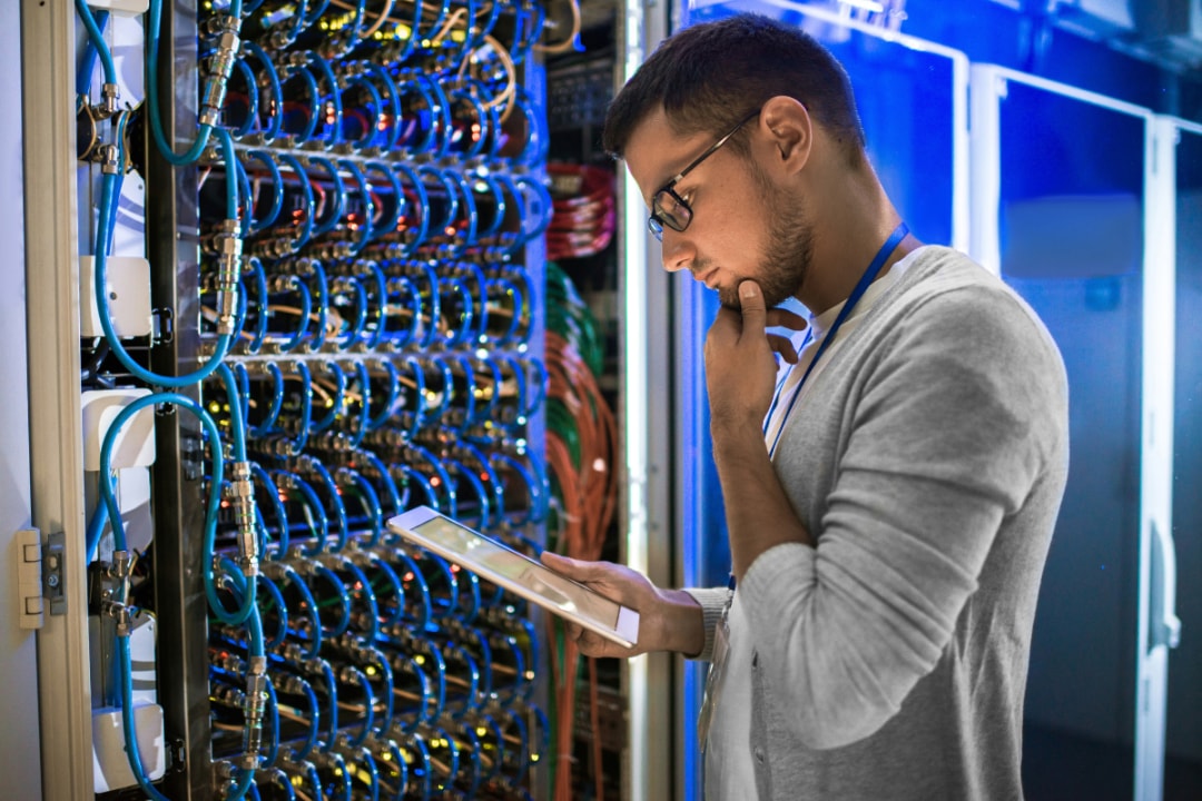 Employee or student reviewing hardware 